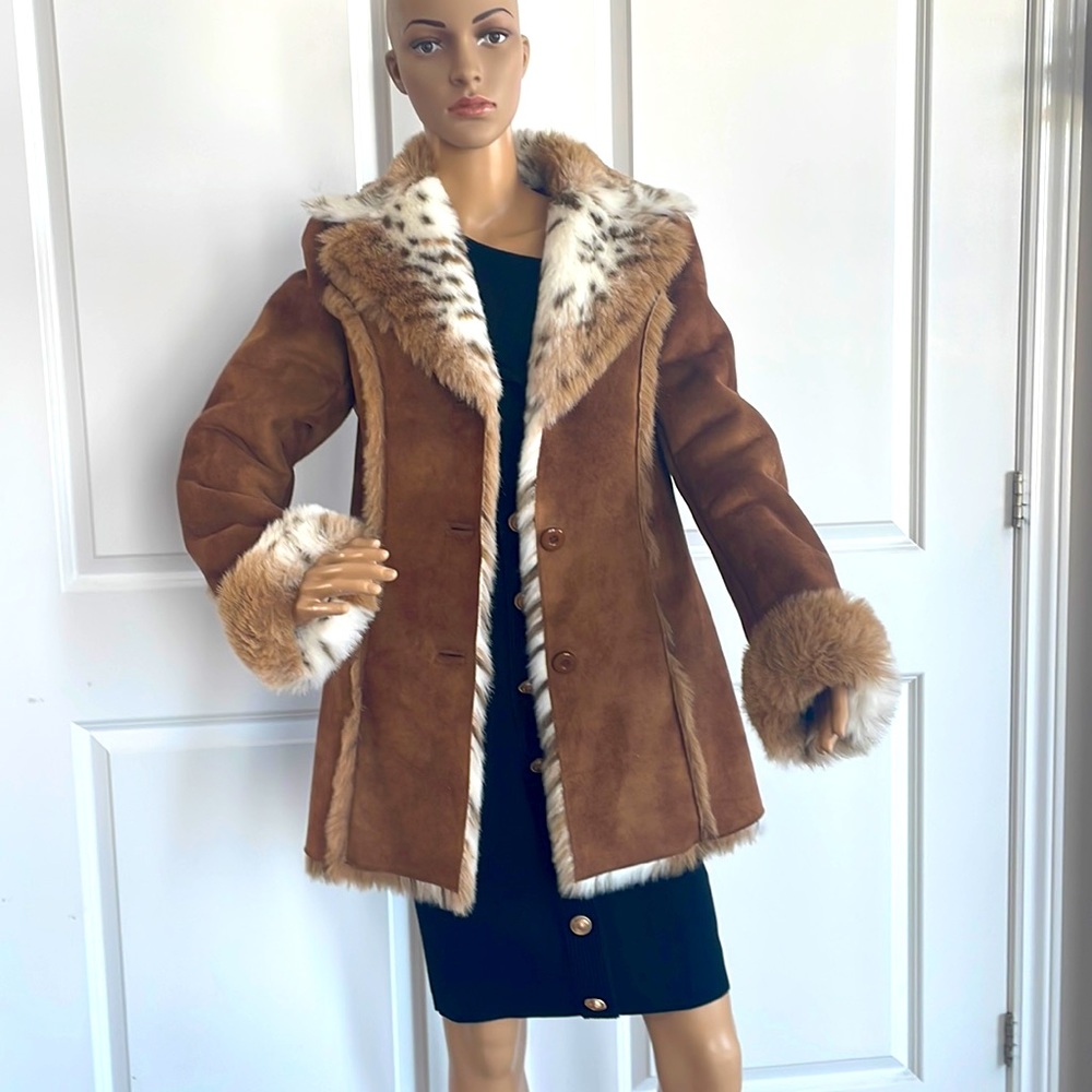 Faux fur and faux shearling jacket by Regal faux furs. Size small. NWOT.